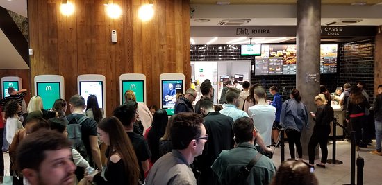 long queue at a kiosk machine.jpg