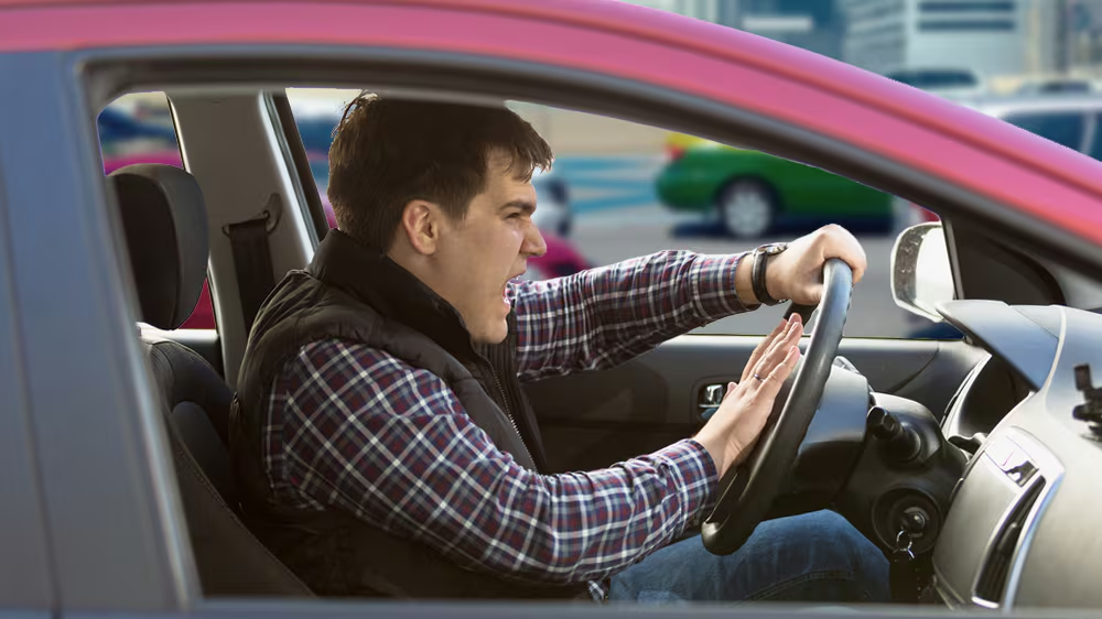 driver honking in a car traffic jam